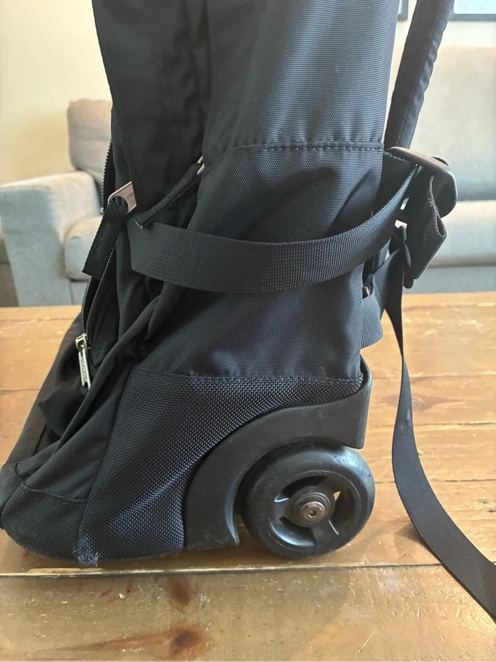 L.L. Bean Black Rolling Backpack with Silver Reflective Accent